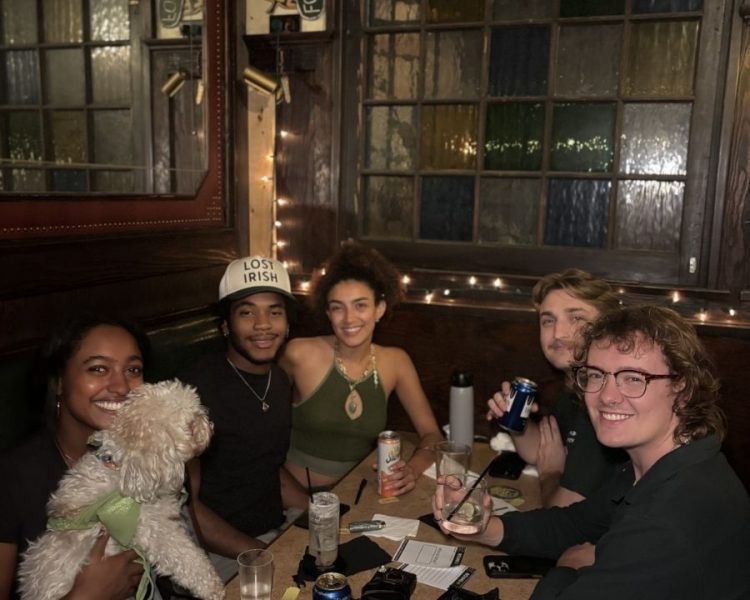 Friends enjoying a weekly pub trivia night at Tom Bergin's Irish Pub in Fairfax, Los Angeles
